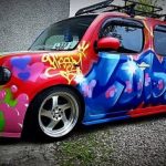 nissan cube in a wild paint pattern, imported to UK from Japan.
