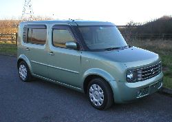 nissan cube pastel green pastel green nissan cube